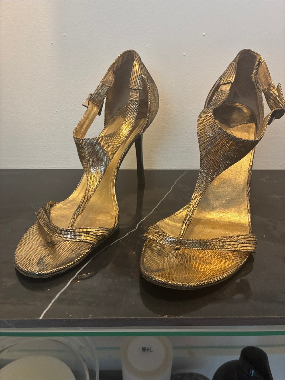 BCBGMaxAzria Gold Metallic T-Strap Stiletto Sandals